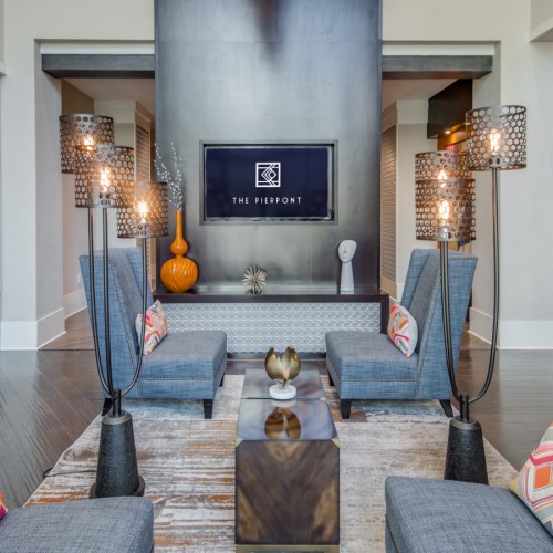 Where comfort and convenience meet a living room with a tv and couches