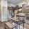 a kitchen with a table and chairs