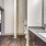 a bathroom with a marble countertop